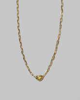 Closeup details of the Northern Lights Necklace 005 on light color background.