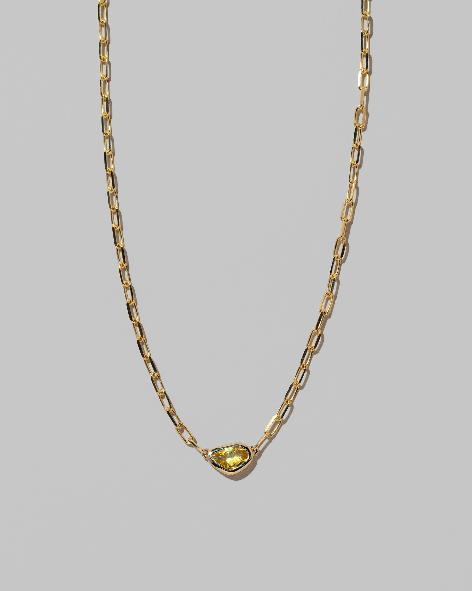 Closeup details of the Northern Lights Necklace 005 on light color background.