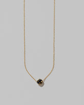 Closeup details of the Northern Lights Necklace 007 on light color background.