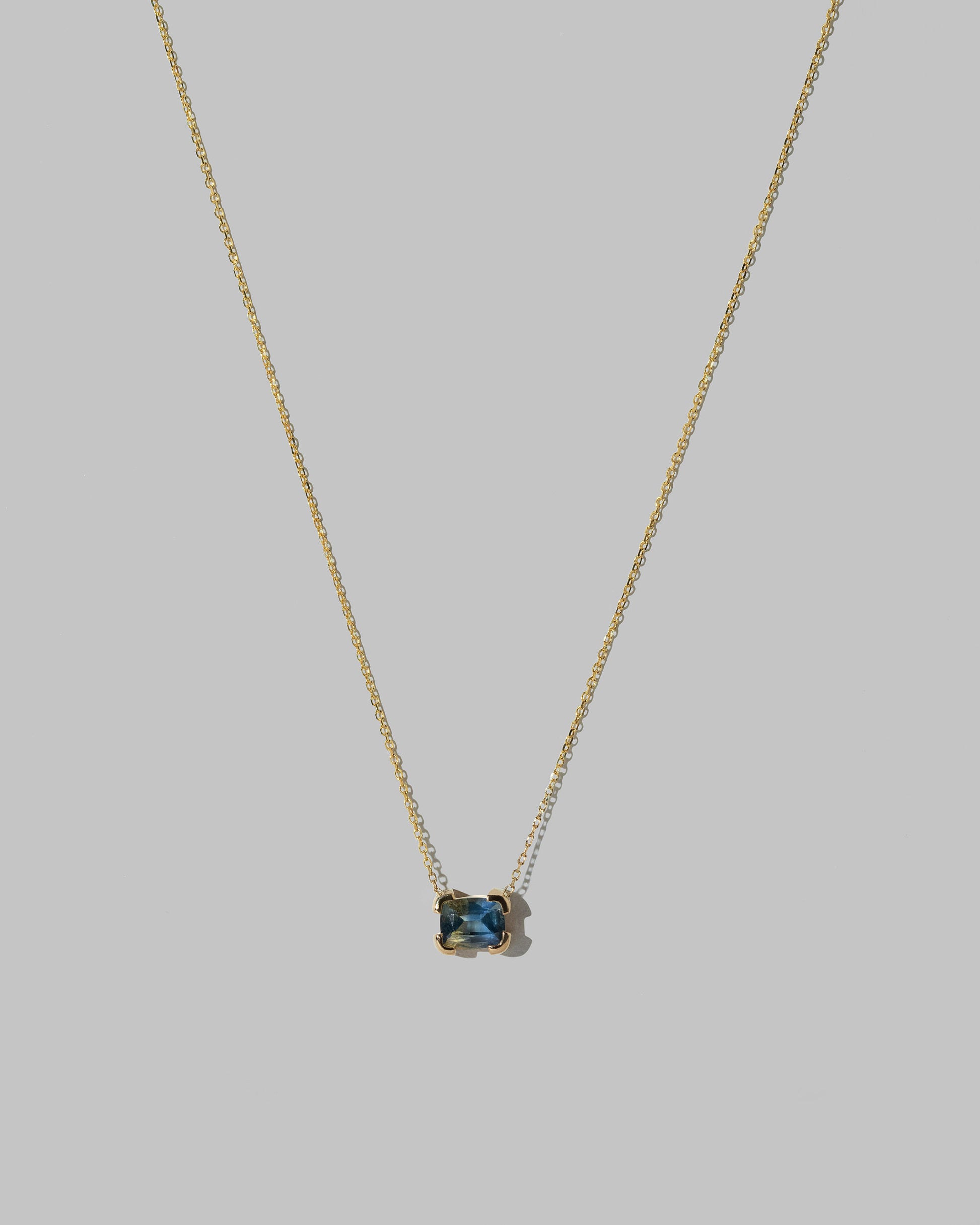 Closeup details of the Northern Lights Necklace 008 on light color background.