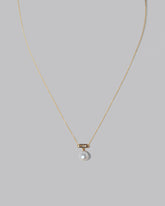 Closeup details of the Poseidon Necklace on light color background.