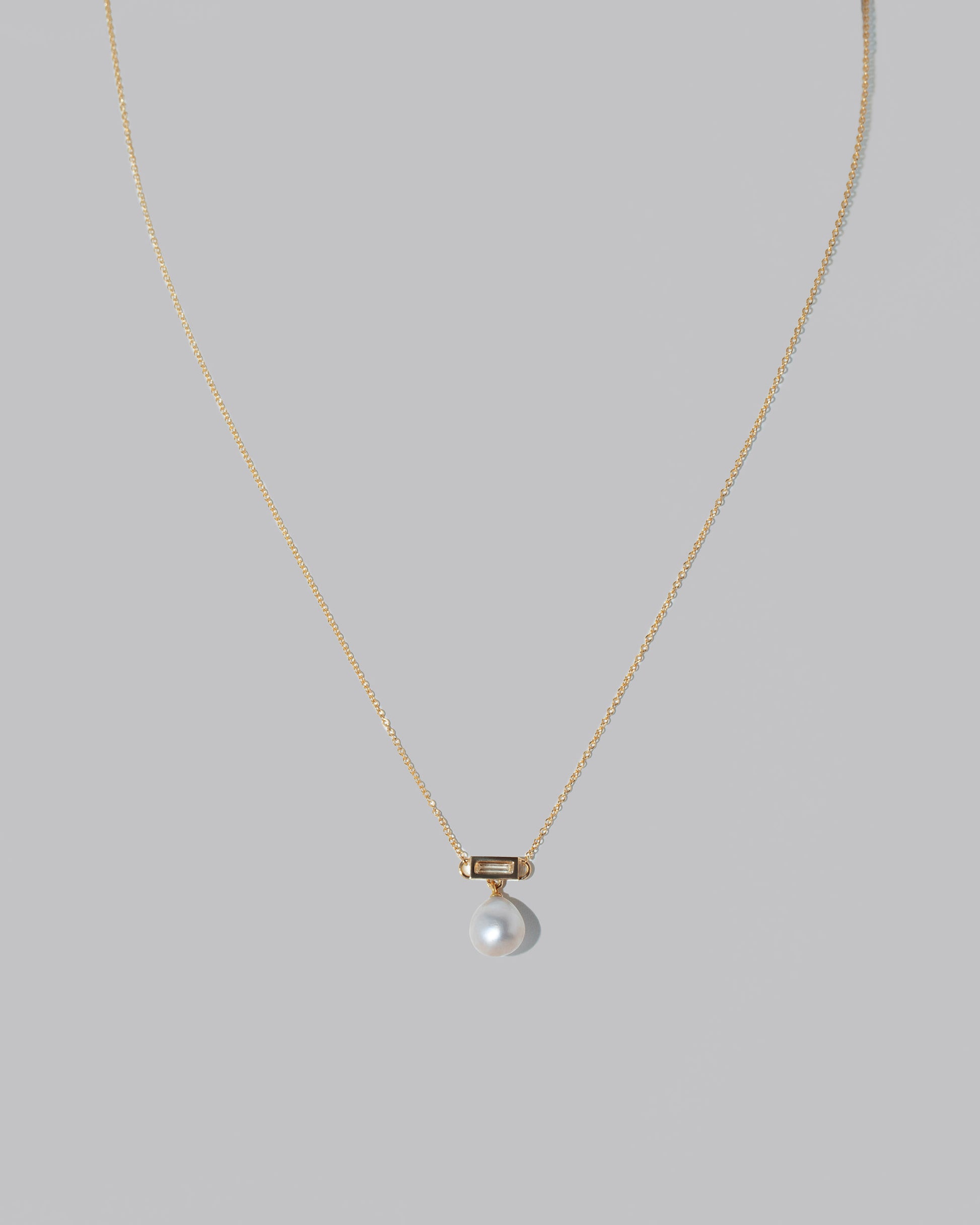 Closeup details of the Poseidon Necklace on light color background.