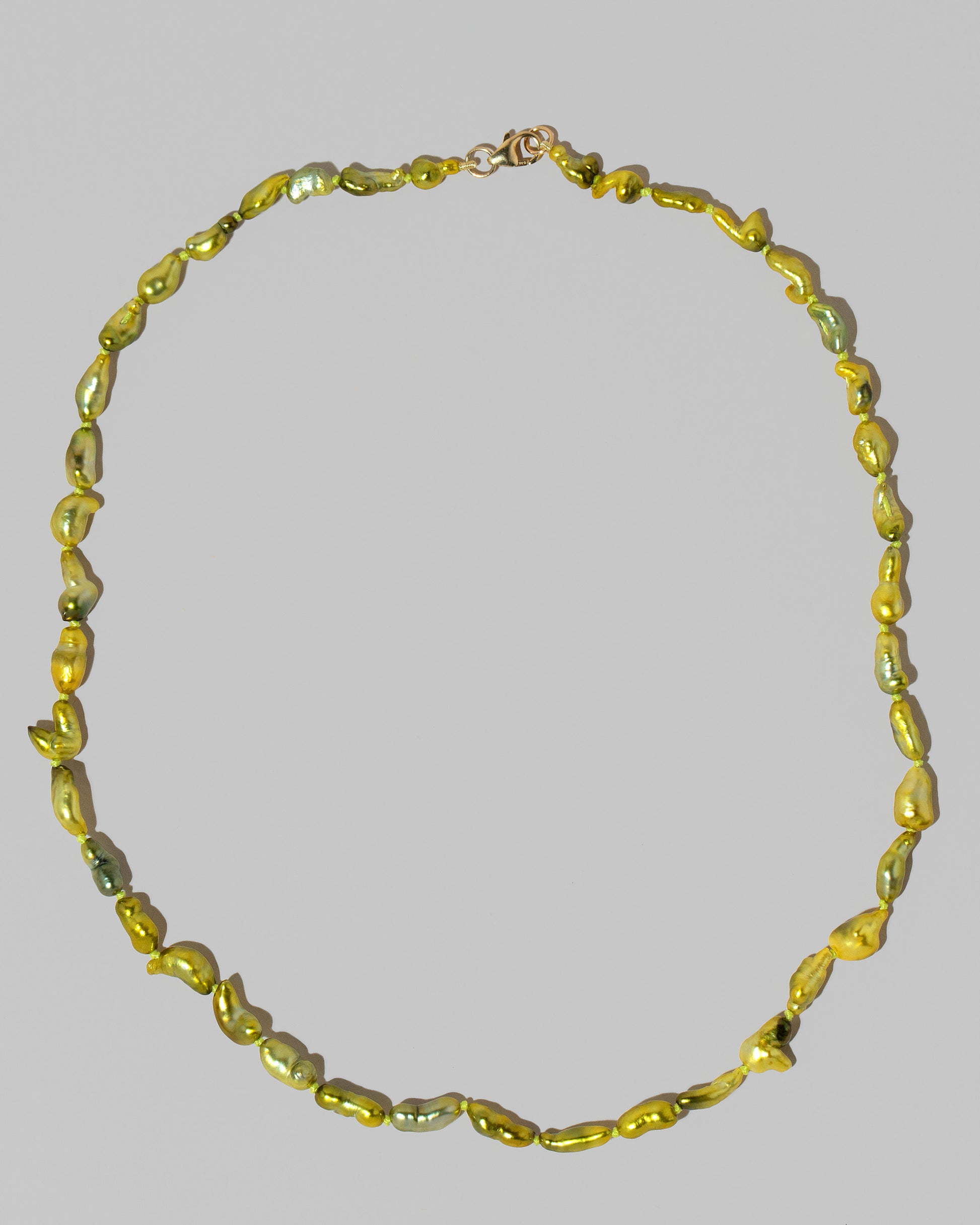 Ula Pearl Necklace 003 on light color background.