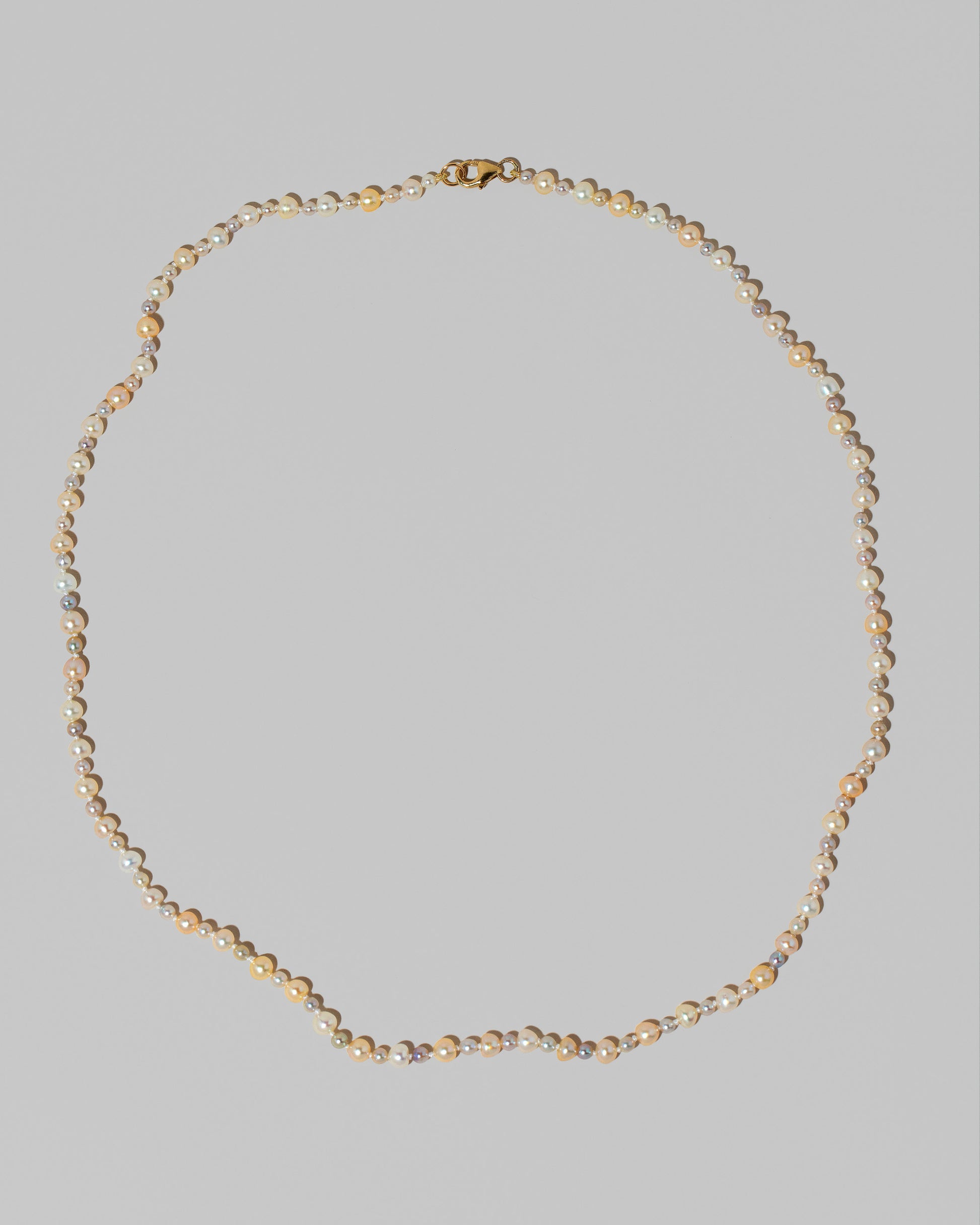 Ula Pearl Necklace 004 on light color background.