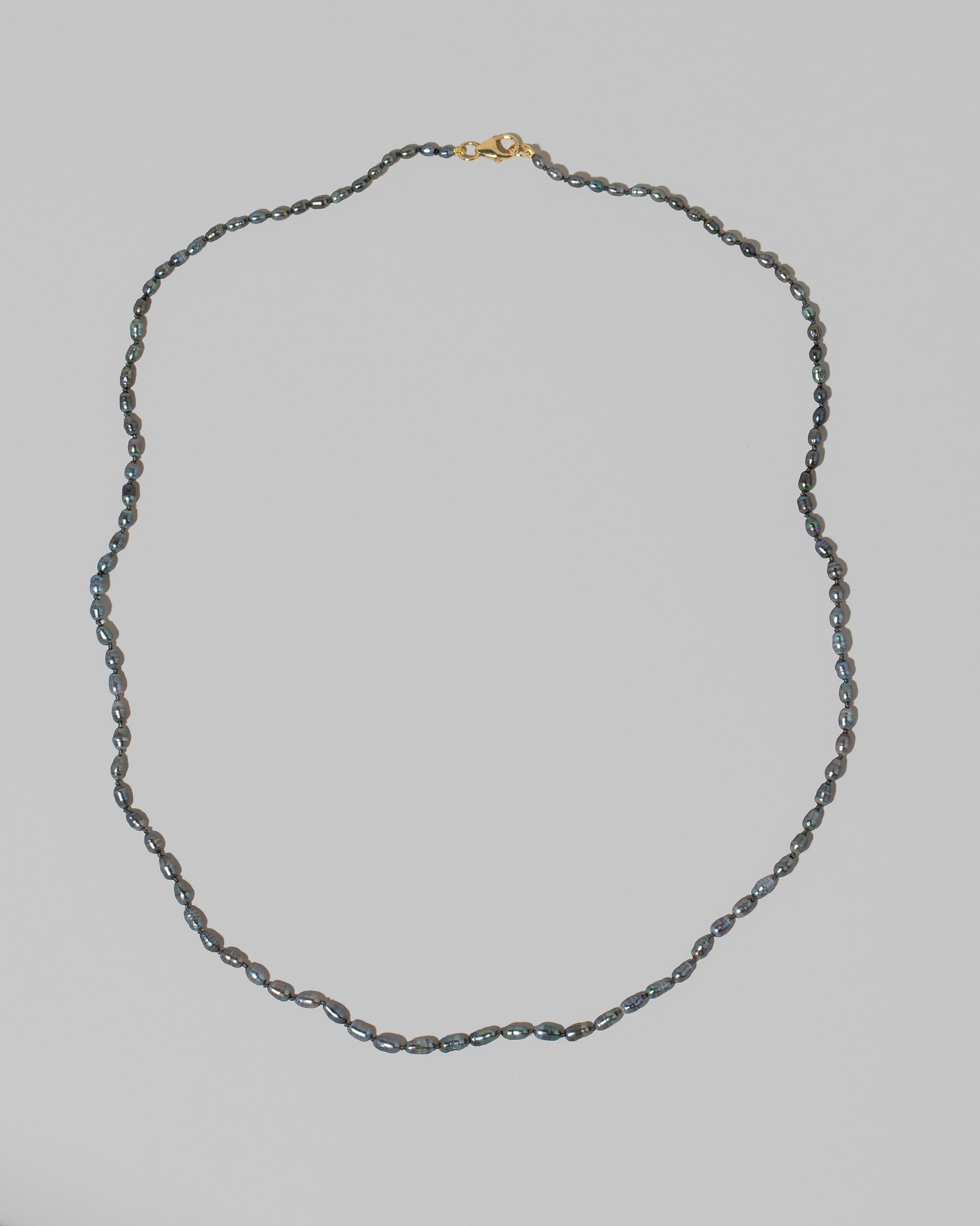 Ula Pearl Necklace 006 on light color background.