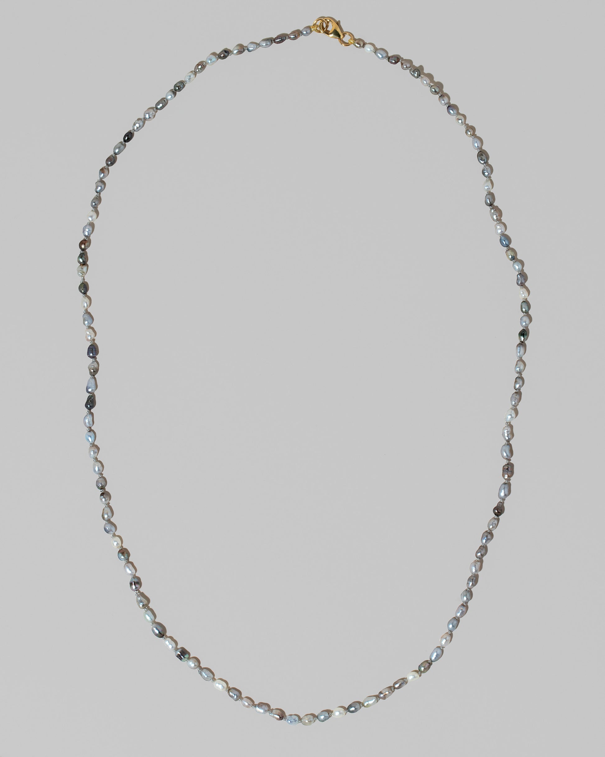 Ula Pearl Necklace 007 on light color background.