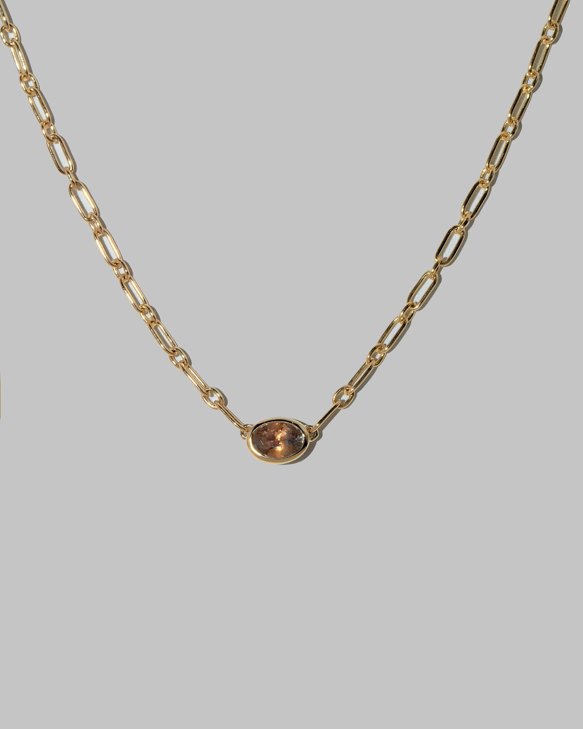 Closeup details of the Northern Lights Necklace 001 on light color background.