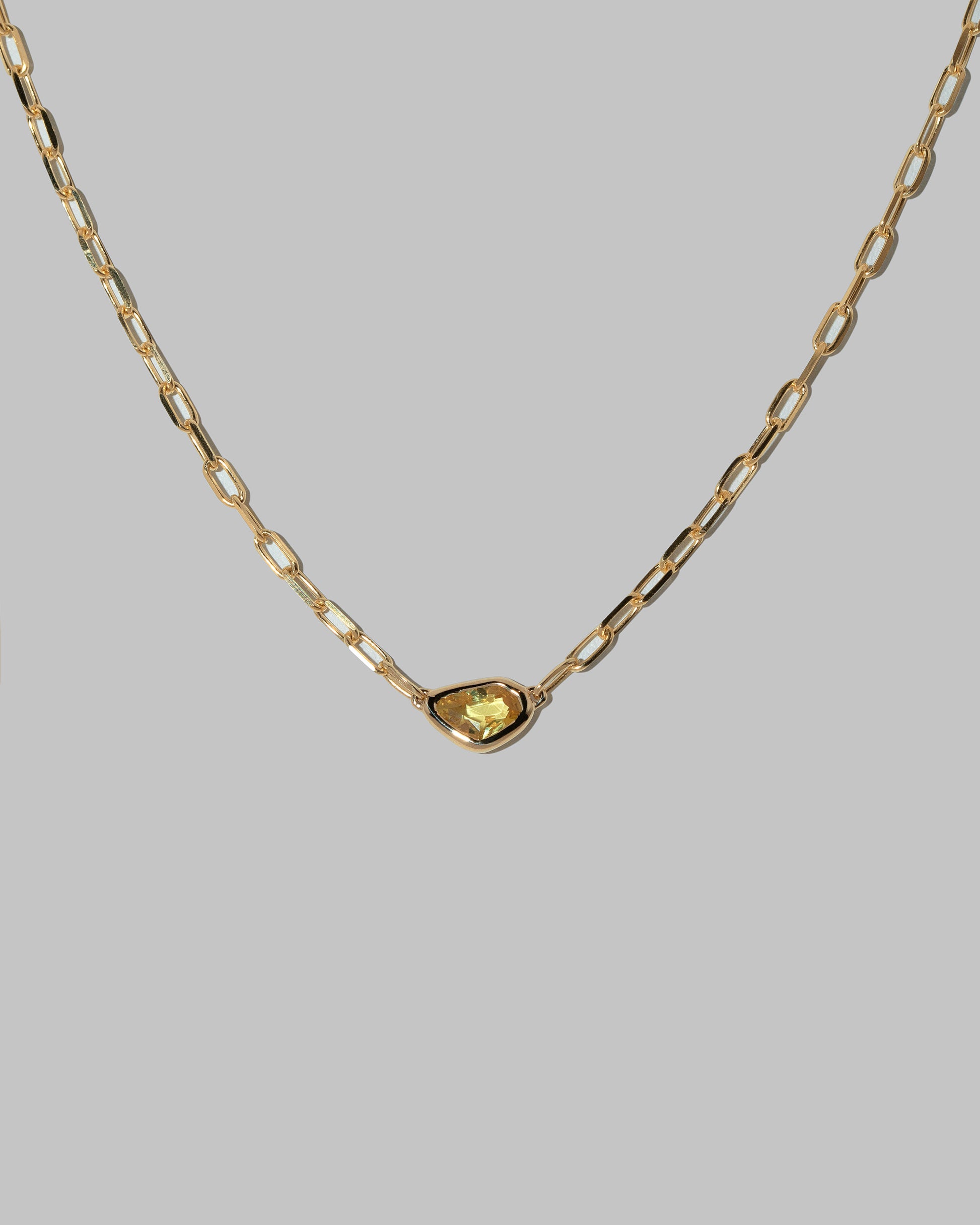 Closeup details of the Northern Lights Necklace 005 on light color background.