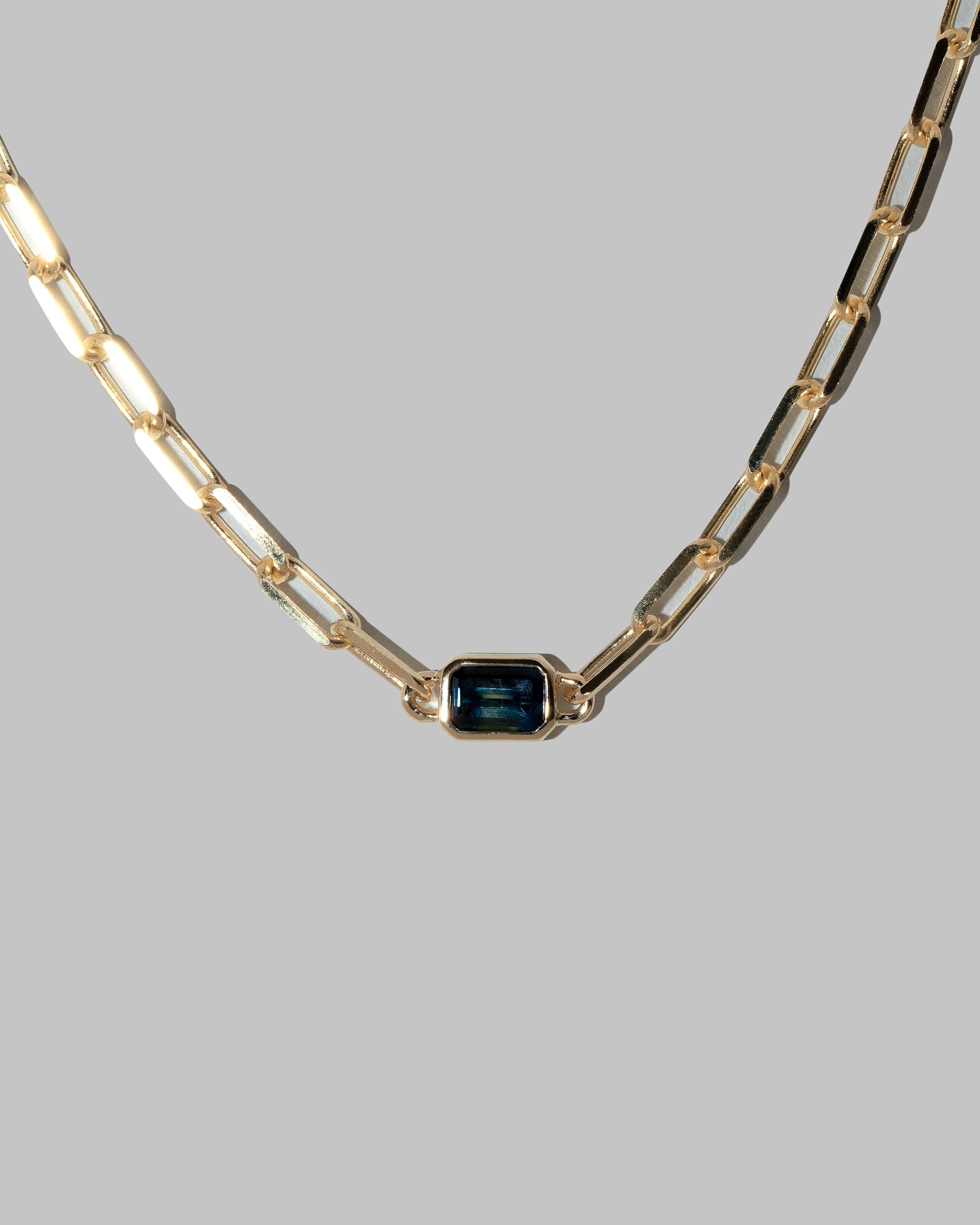 Closeup details of the Northern Lights Necklace 009 on light color background.