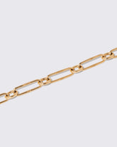 Closeup details of the Gold Link Necklace on light color background.