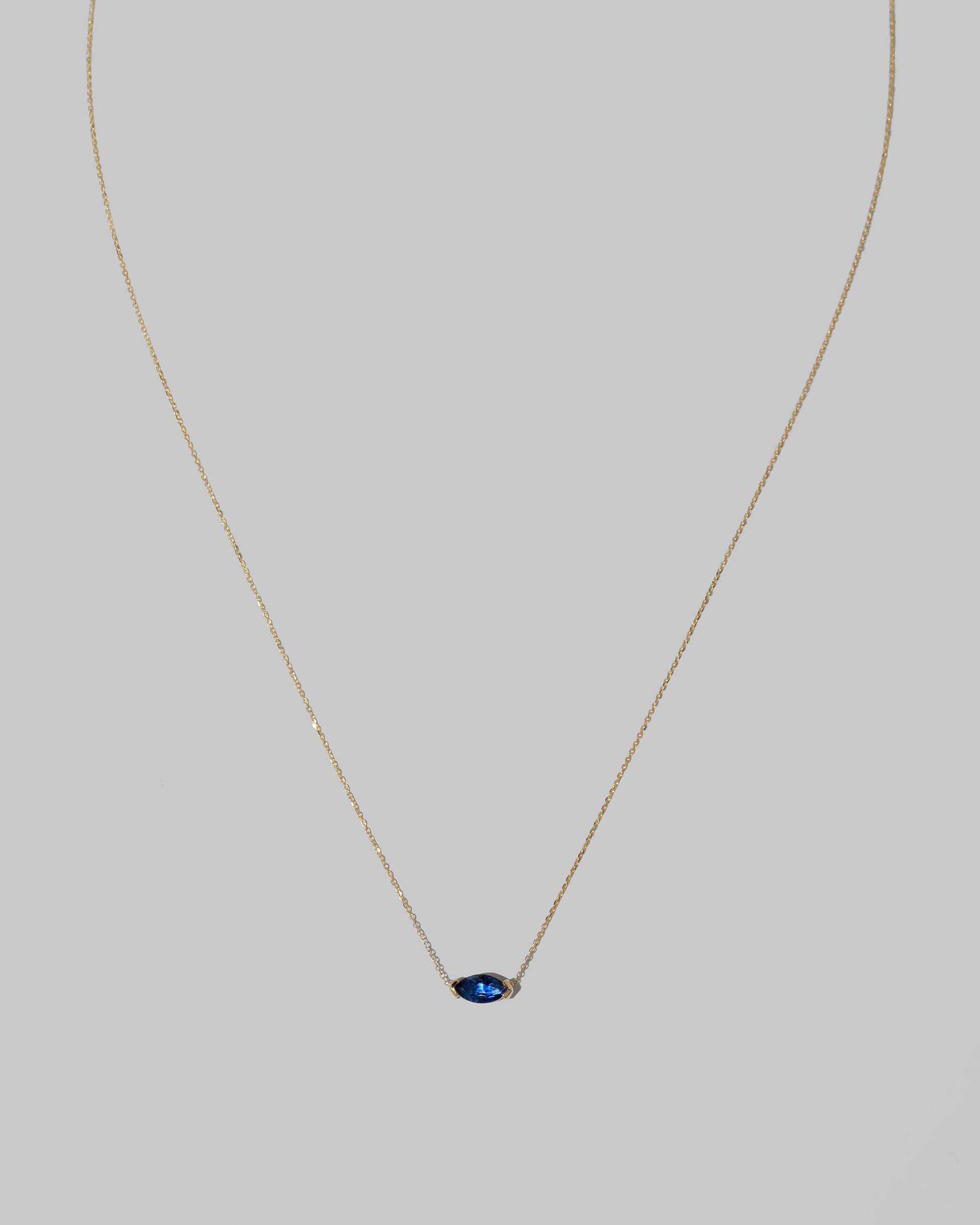 Closeup details of the Northern Lights Necklace 002 on light color background.