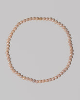 Faceted Sugar Pearl Necklace on light color background.