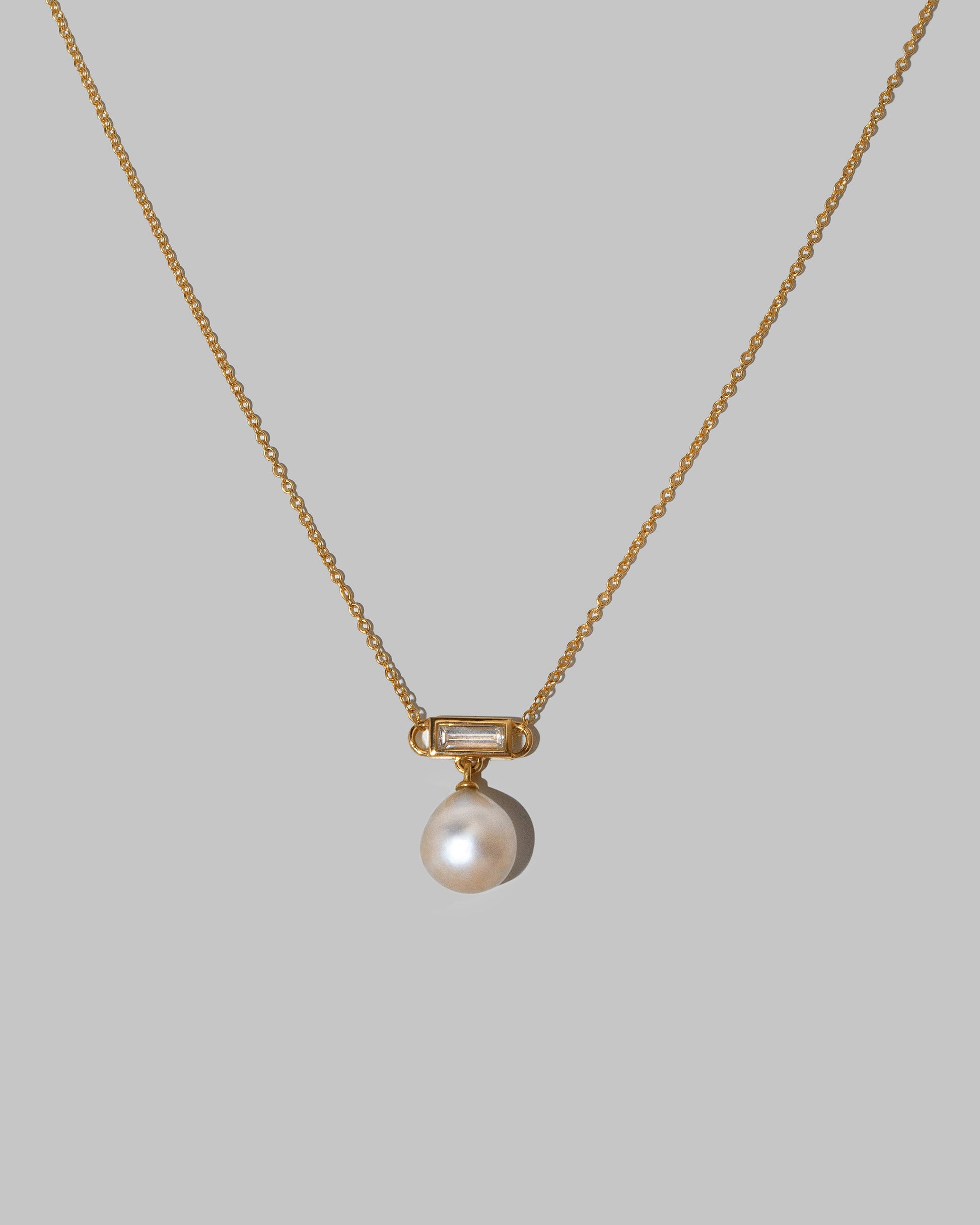 Closeup details of the Poseidon Necklace on light color background.