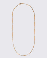 Tricolor Butter Chain Necklace on light color background.