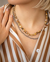 Ula Pearl Necklace 006 and Ula Pearl Necklace 002 on model.