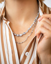 Ula Pearl Necklace 001 and Ula Pearl Necklace 005 on model.