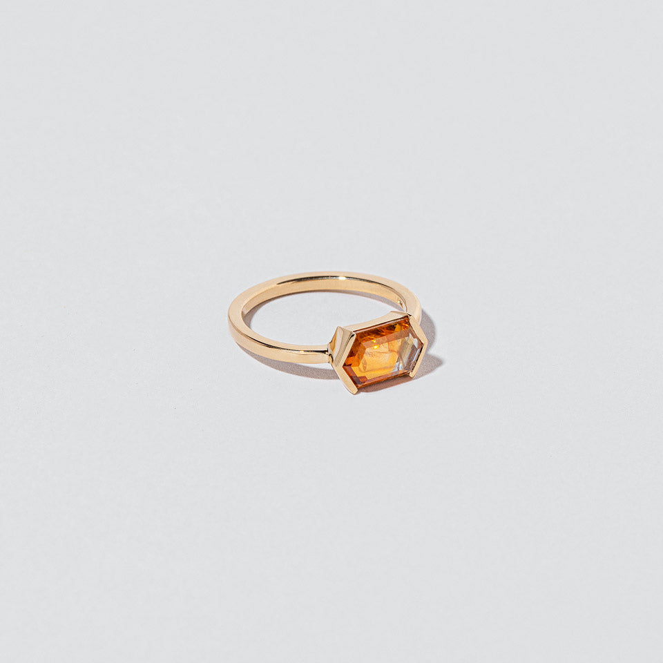 product_details::Closeup details of the Dawnstar Ring on light color background.