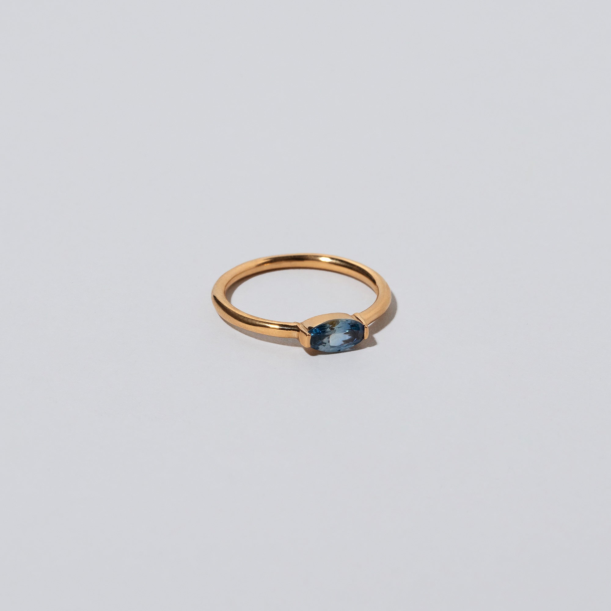 product_details::Blue Devant Ring on light color background.