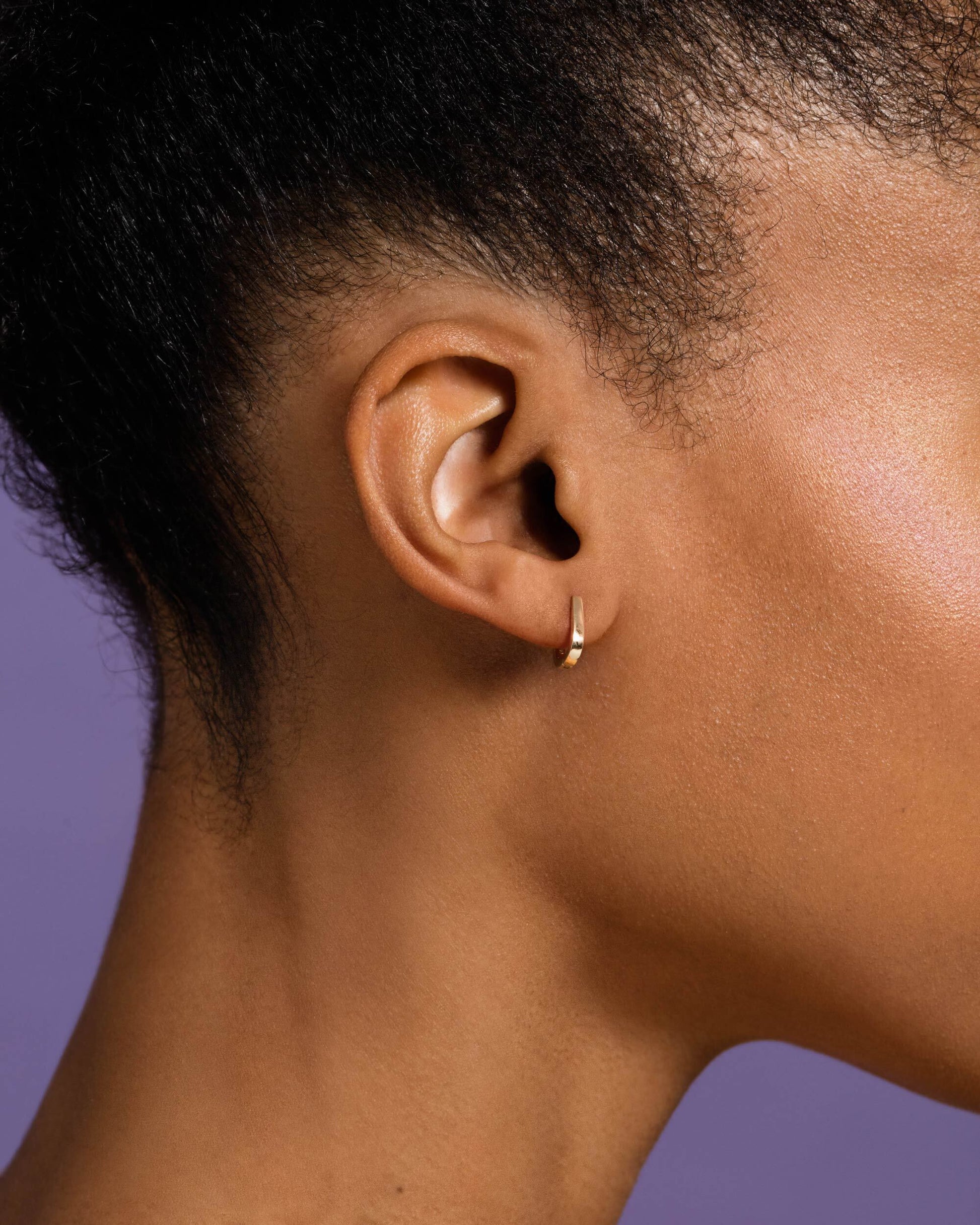 Poppy Flower Bud Hoop Earrings on model.