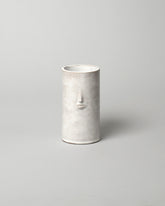 Rami Kim Glossy White Face Vase on light color background.