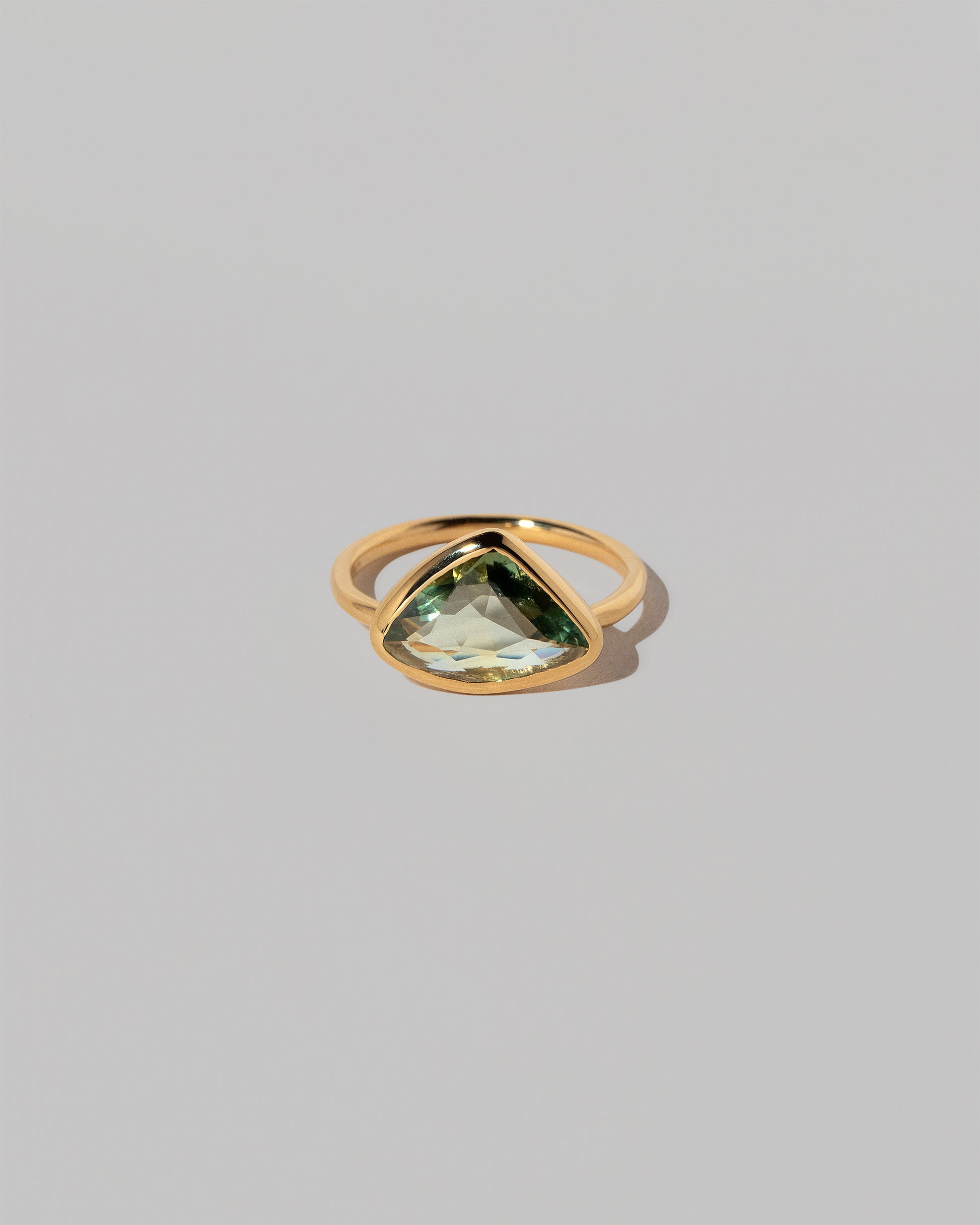 Gusher Green Sapphire Ring 036 on light color background.