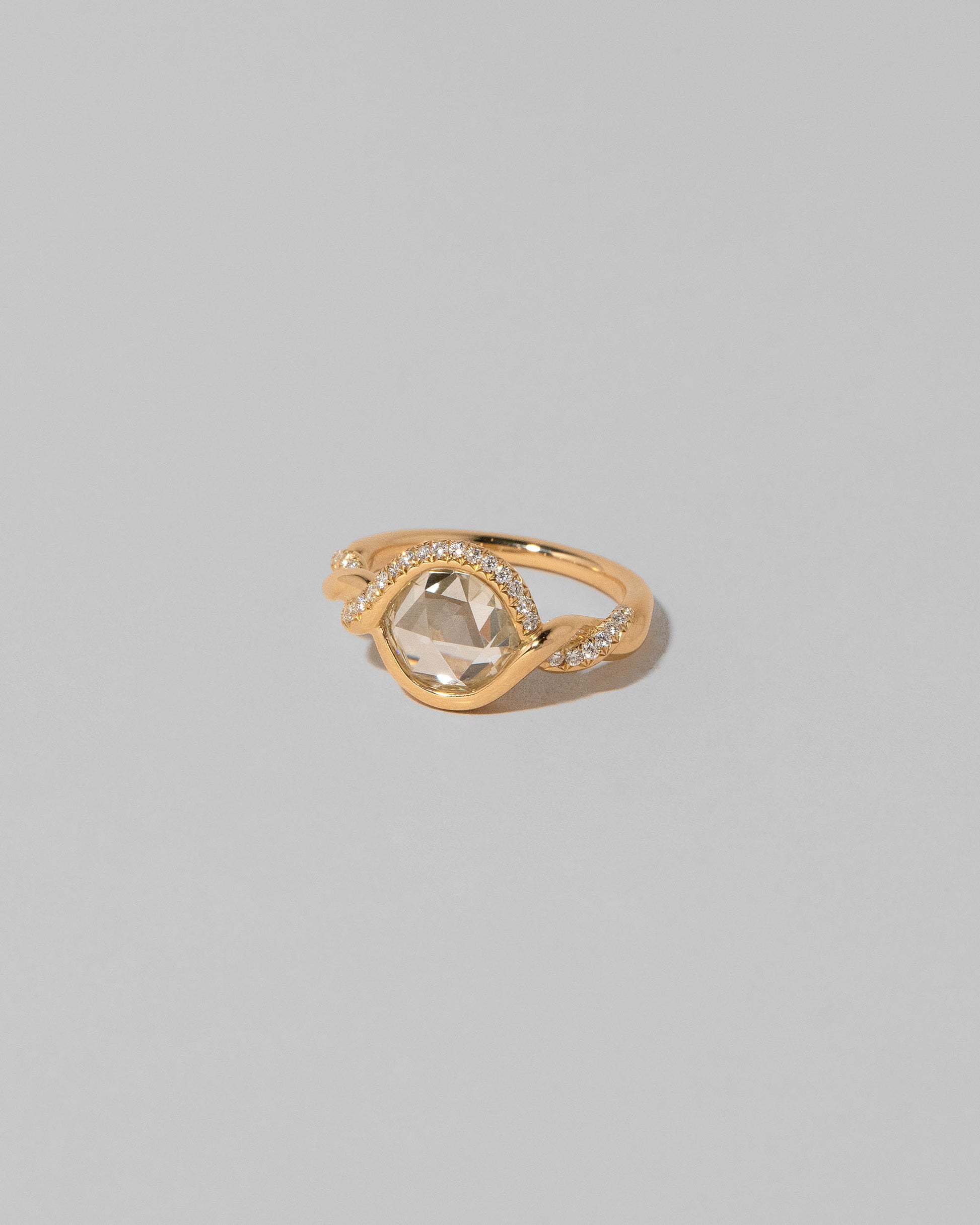 View from the side of the Entwine Ring on light color background.