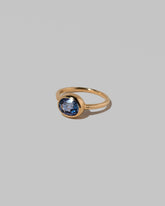 View from the side of the Geyser Blue Sapphire Ring 002 on light color background.