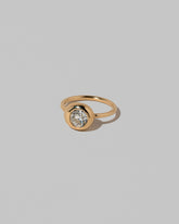 View from the side of the Diamond Level Ring on light color background.