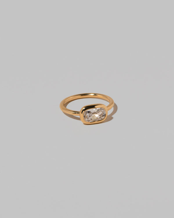 View from the side of the Gusher Diamond Ring 017 on light color background.