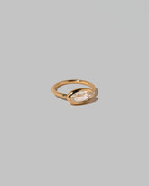 View from the side of the Gusher Diamond Ring 019 on light color background.