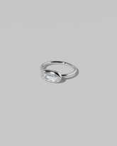 View from the side of the Gusher Diamond Ring 029 on light color background.