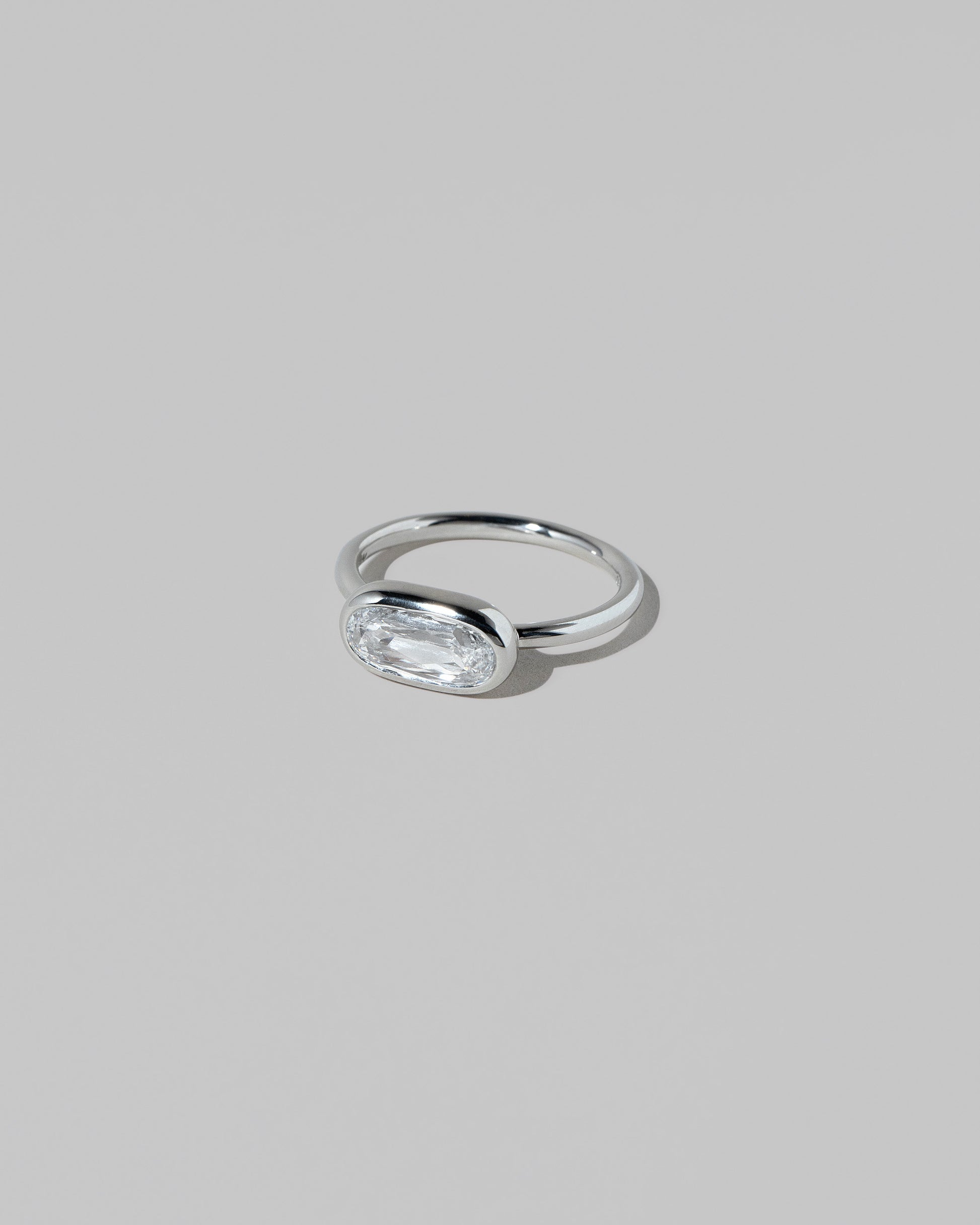 View from the side of the Gusher Diamond Ring 029 on light color background.