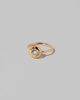 View from the side of the Diamond Grand Level Ring on light color background.