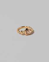 View from the side of the Wrapped Ring on light color background.