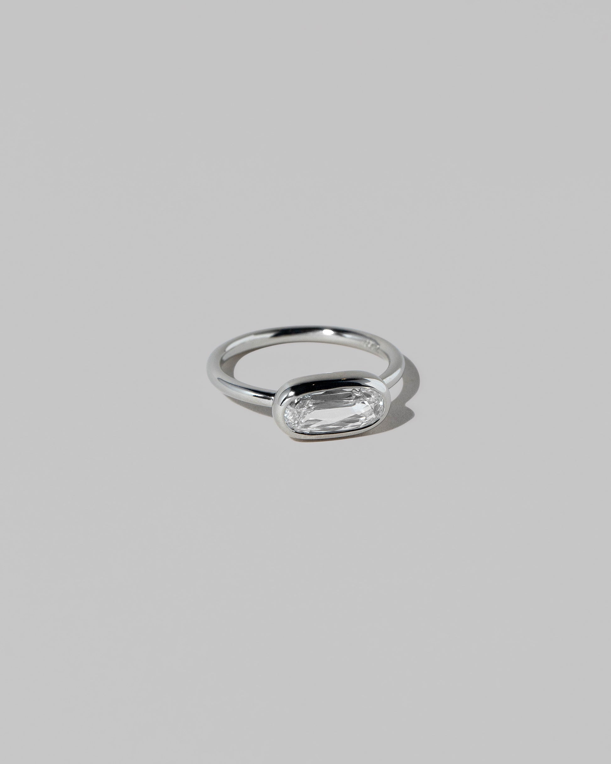 View from the side of the Gusher Diamond Ring 029 on light color background.