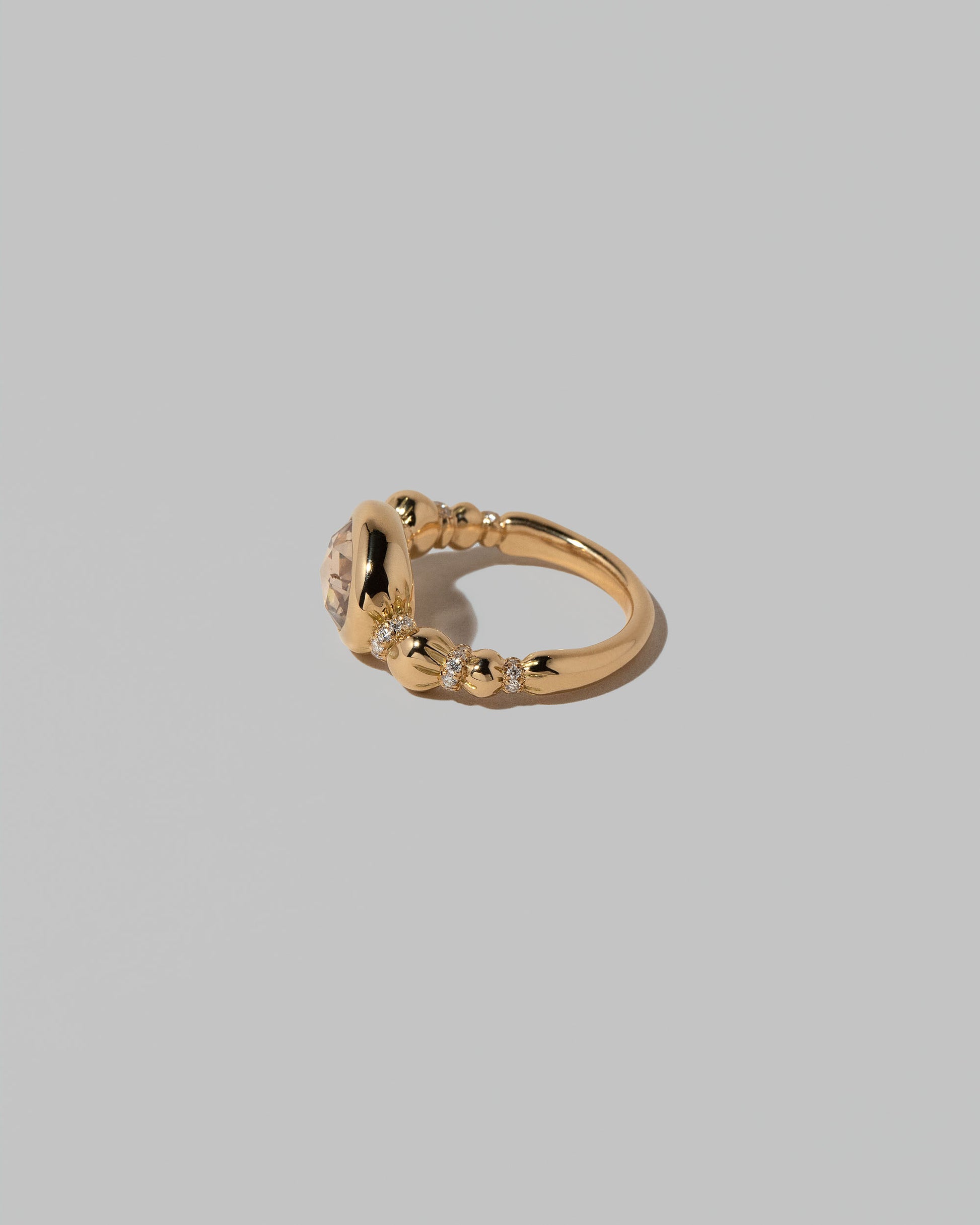View from the back of the Wrapped Ring on light color background.