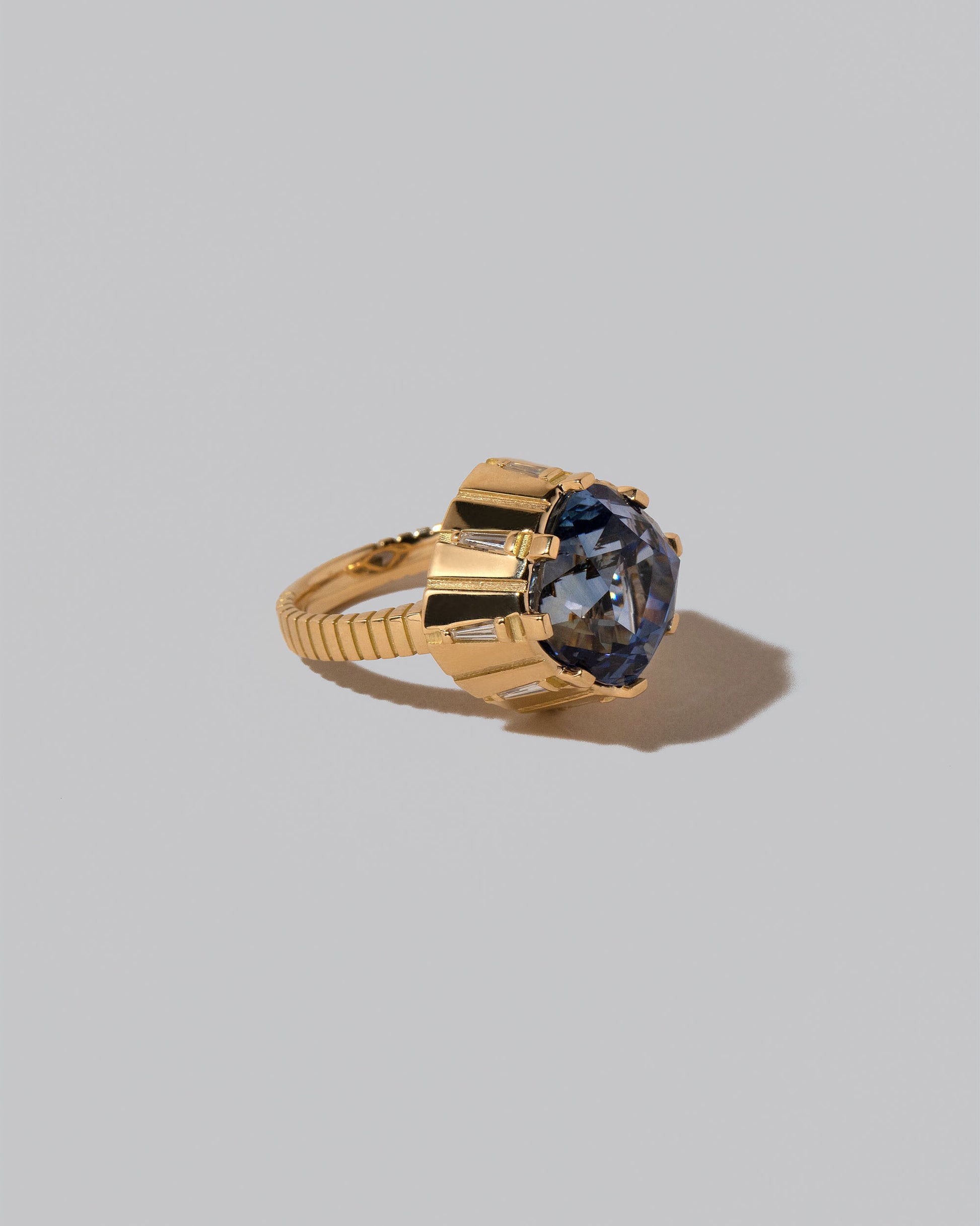Closeup details of the Alluim Ring on light color background.