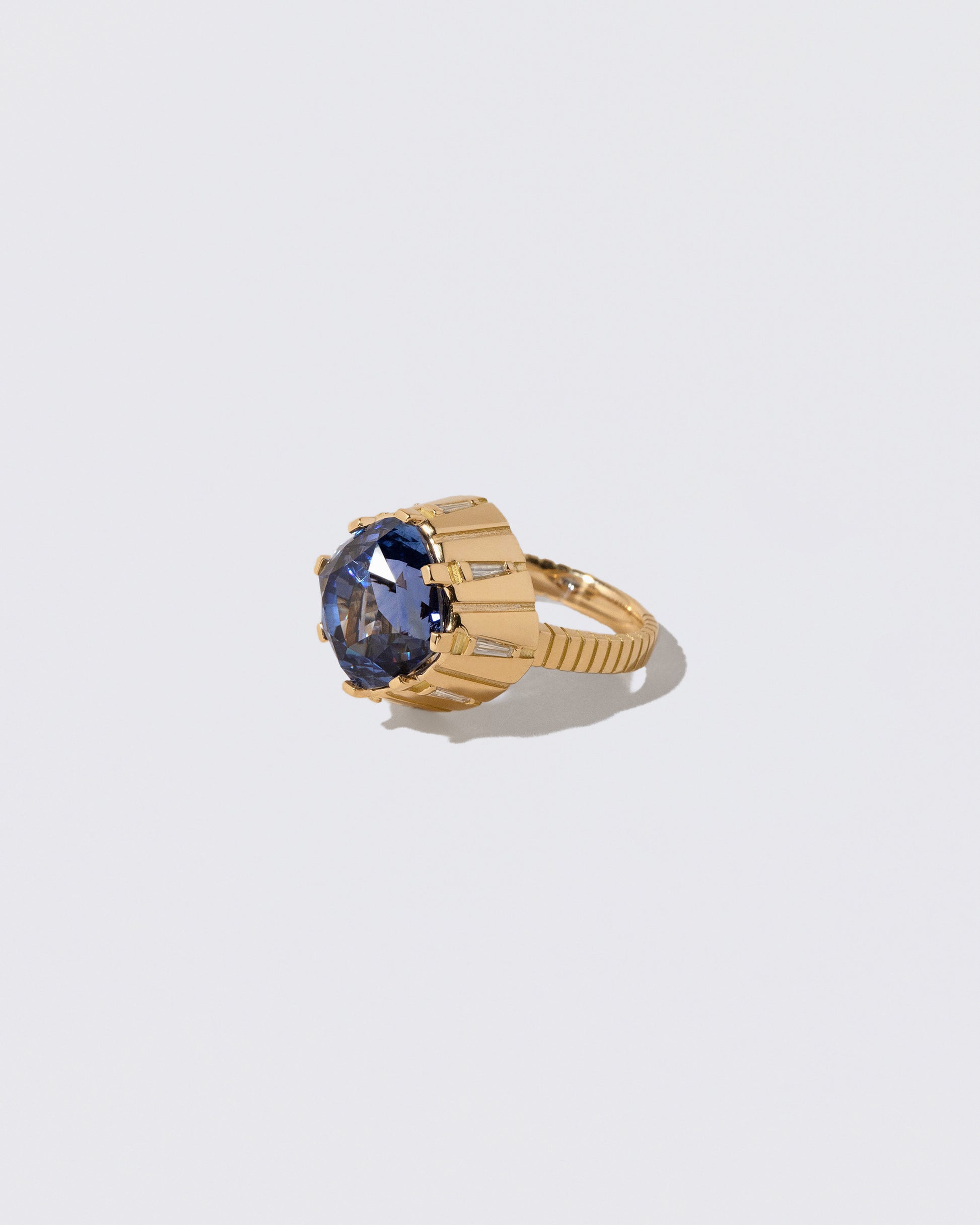 View from the side of the Alluim Ring on light color background.