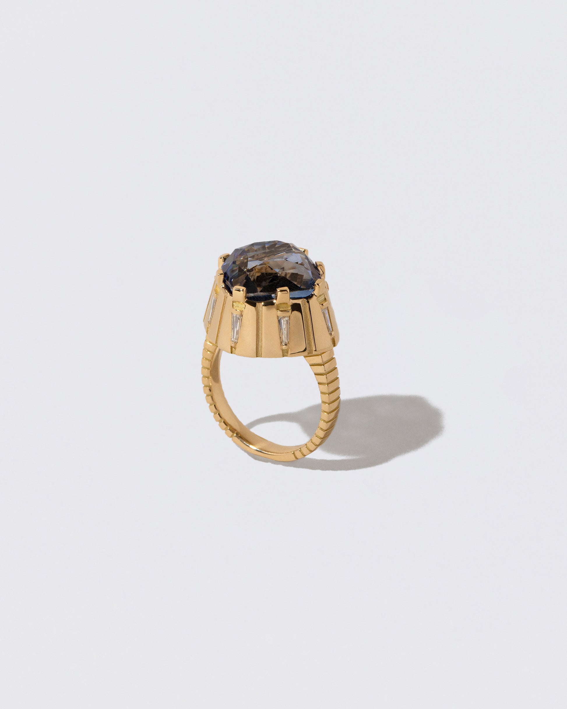 Closeup details of the Alluim Ring on light color background.