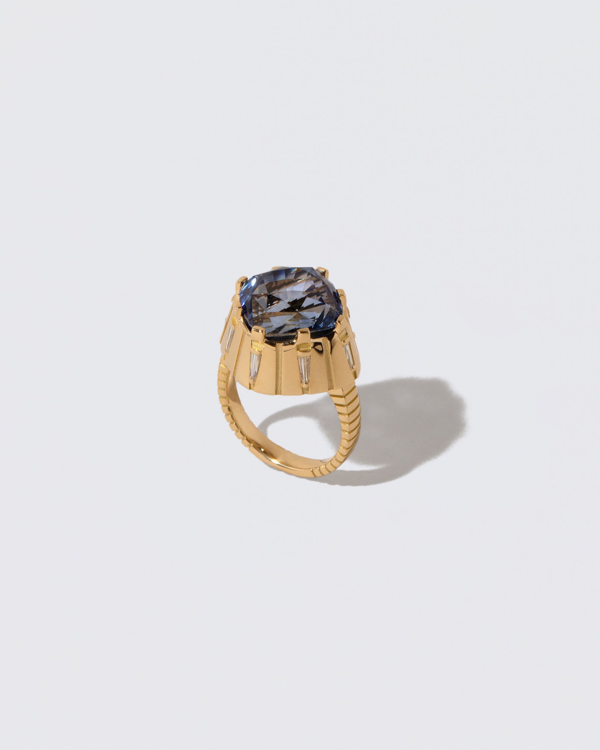 Closeup details of the Alluim Ring on light color background.