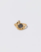Ambrosina Ring on light color background.