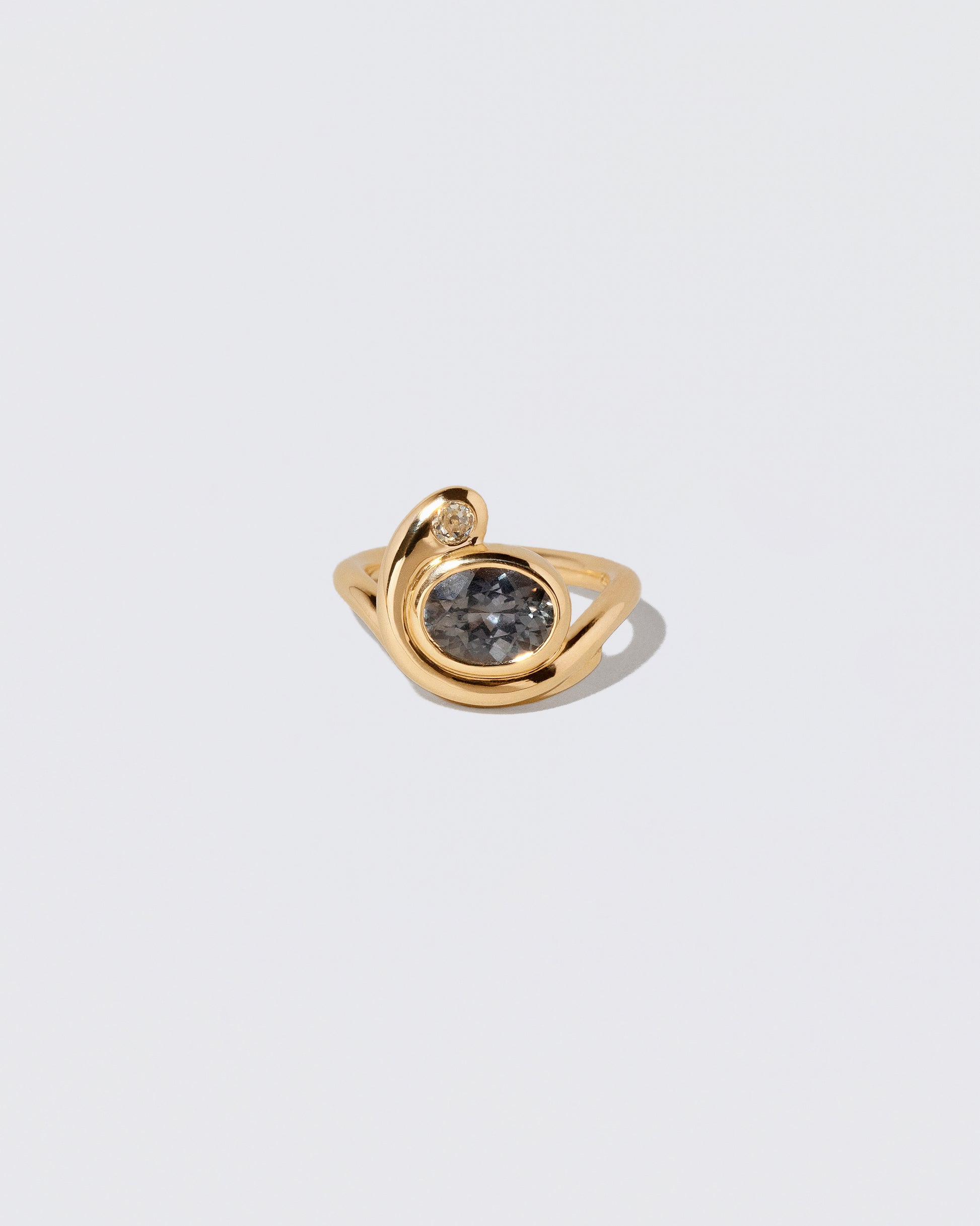 Ambrosina Ring on light color background.
