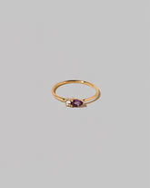 Amethyst Teardrops Ring on light color background.