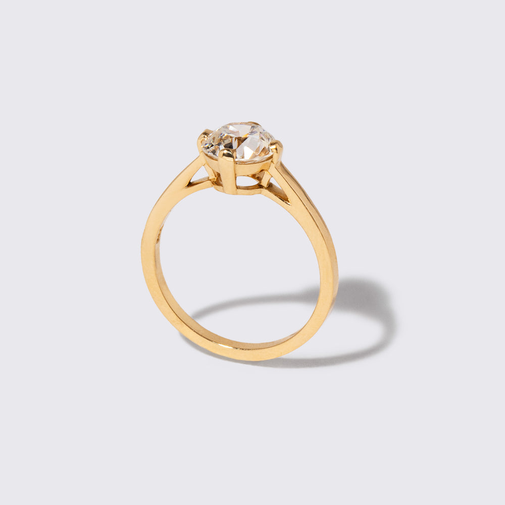product_details::Closeup details of the Super White Diamond Barragán Ring on light color background.