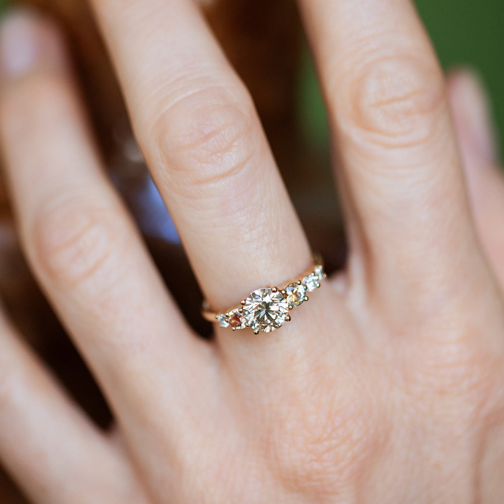 product_details::Champagne Diamond Capella Ring on model.