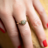 product_details::Champagne Diamond Grand Level Ring on model.
