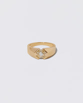 Compassion Ring on light color background.