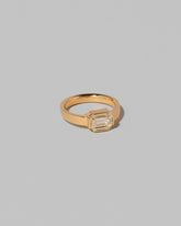 View from the side of the Diamond Fold Ring on light color background.