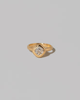 Diamond Poise Ring on light color background.