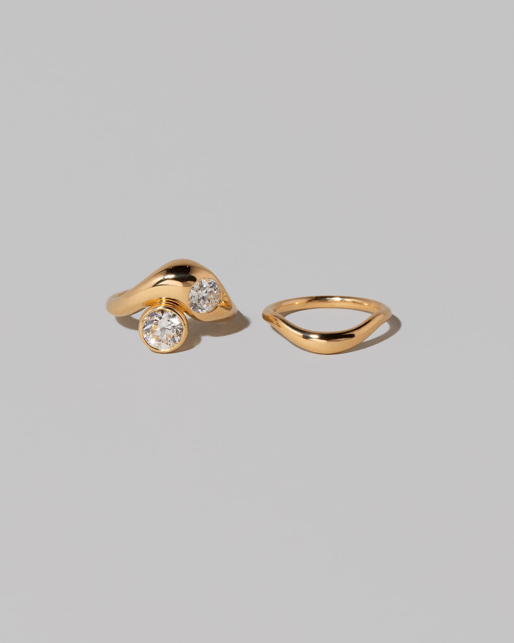 Detail view of the Diamond Two Ring on light color background.